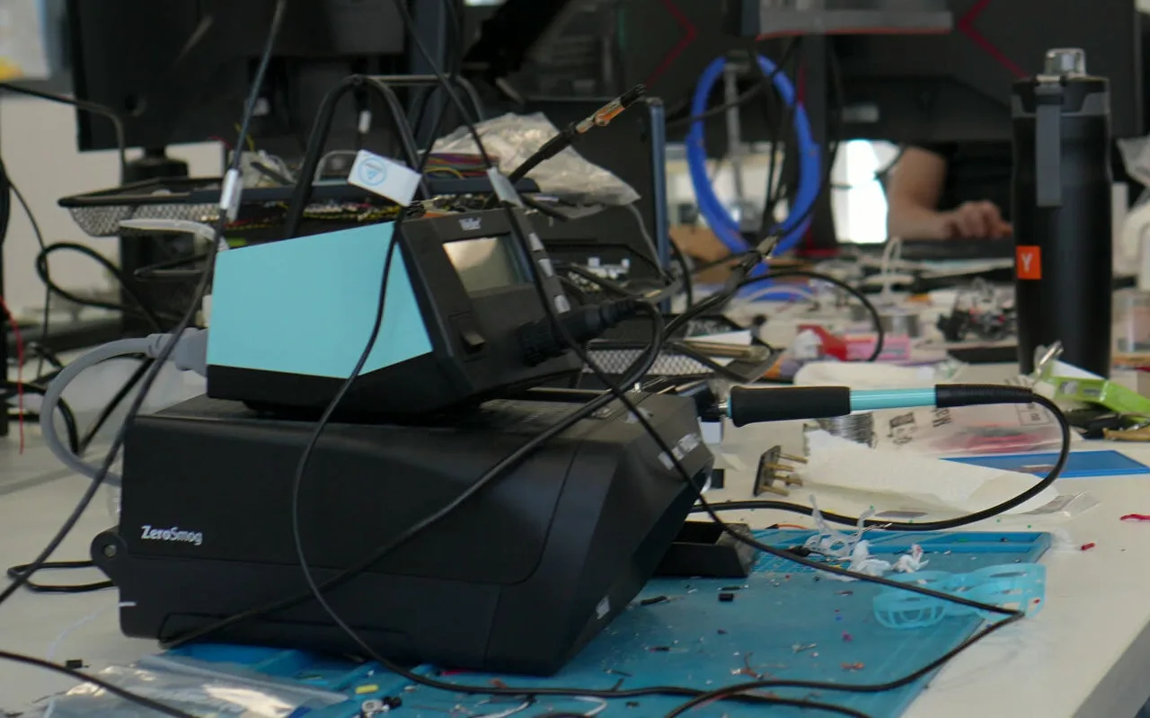 The electronics bench at Tornyol: soldering station, fume extractor and cables